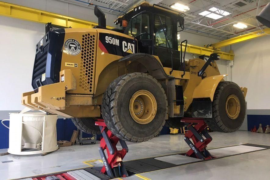 Shovel op Stertil-Koni Ecolift hefbrug